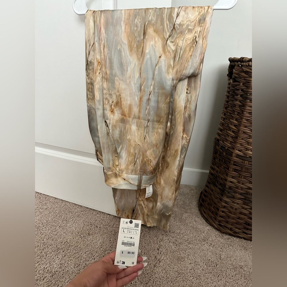 Tie dye two piece - top sold separately since it’s a different size. Runs small